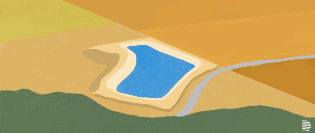 Une méga-bassine entouré de champs avec une rivière assez proche